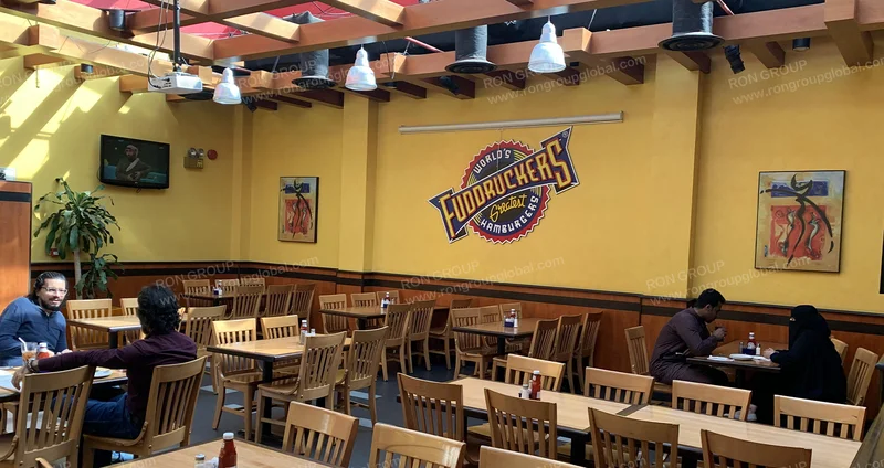 Fuddruckers interior reference: American diner · Warm timber