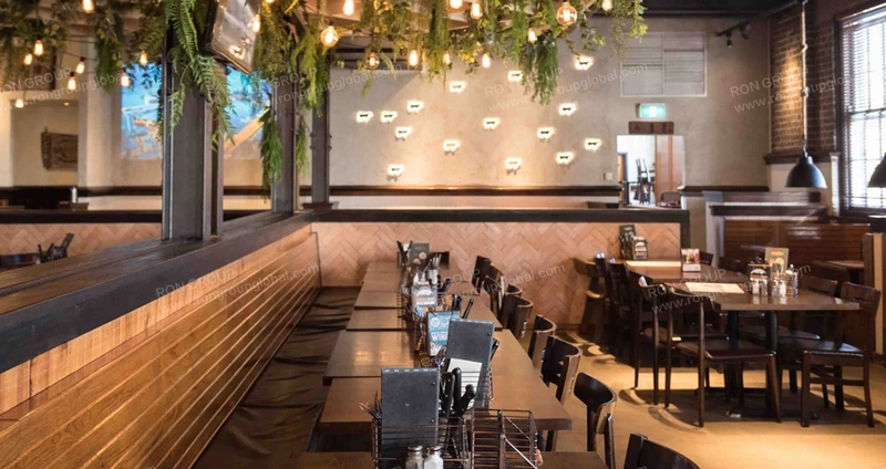 Outback Steakhouse interior reference: Rich timber · Upholstered booth seating