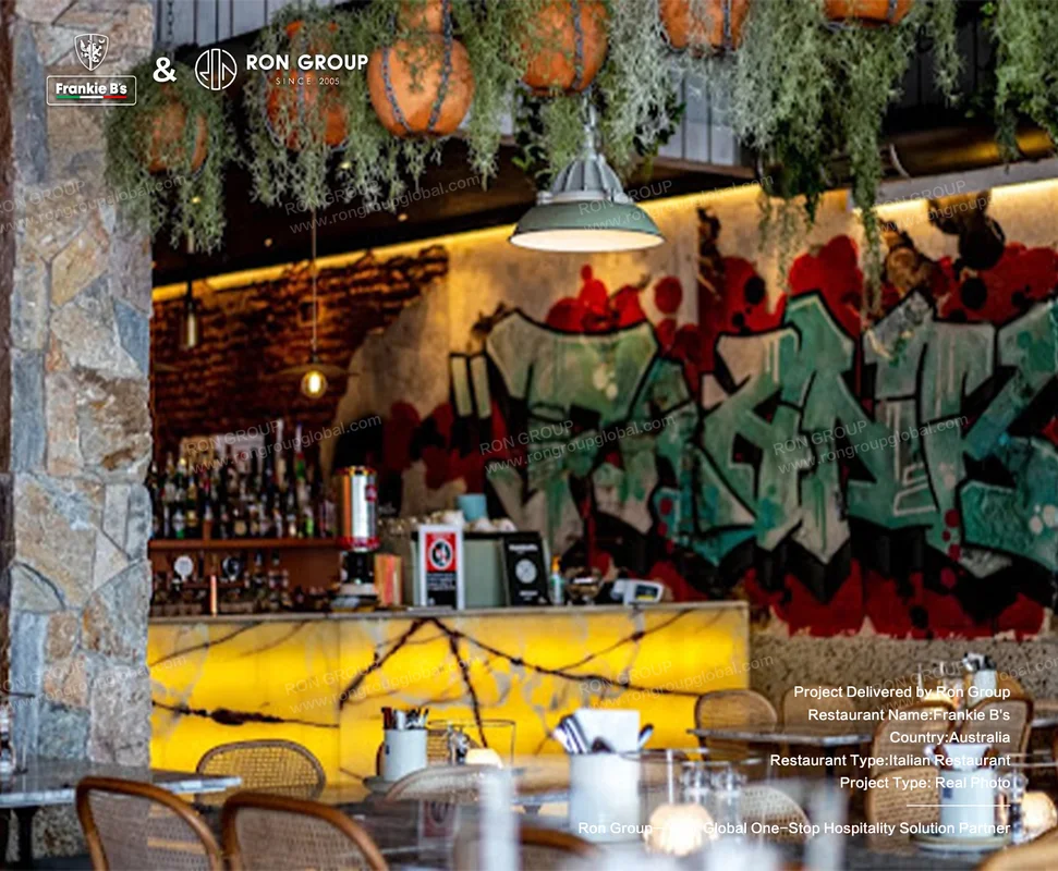 Vibrant graffiti wall art at Frankie B's dining area