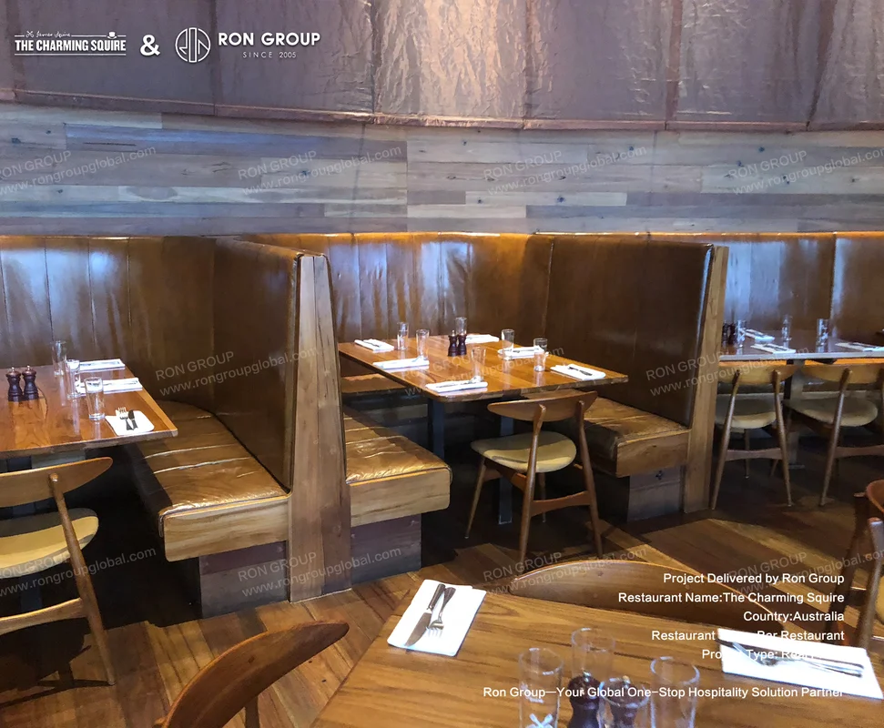 Wooden Booth Seating Wooden booth seating area at THE CHARMING SQUIRE
