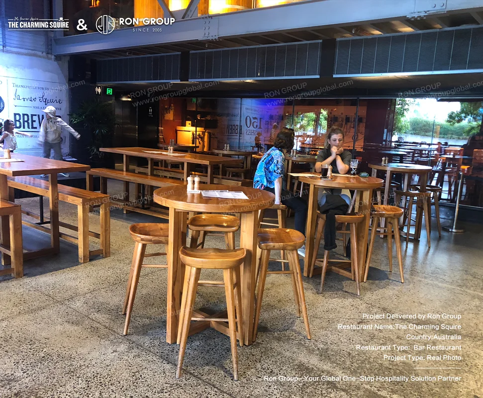 Wooden Tables and Stools Wooden tables and stools supplied for THE CHARMING SQUIRE bar and dining area