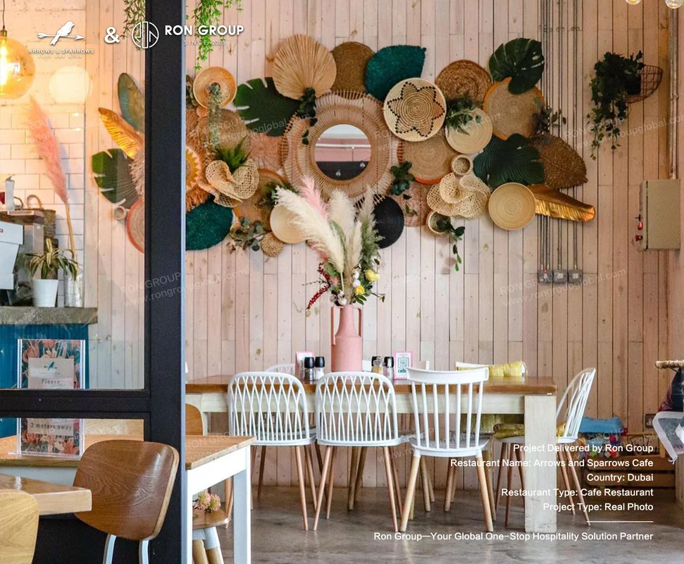 Arrows and Sparrows Cafe interior with white chairs