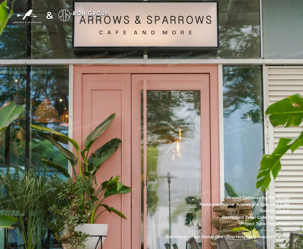 Arrows and Sparrows Cafe pink door with glass panel