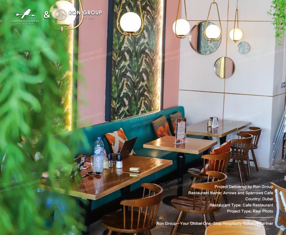 Arrows and Sparrows Cafe teal booth wooden tables