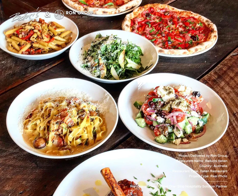 Bellucis pasta salads and pizza on dining table