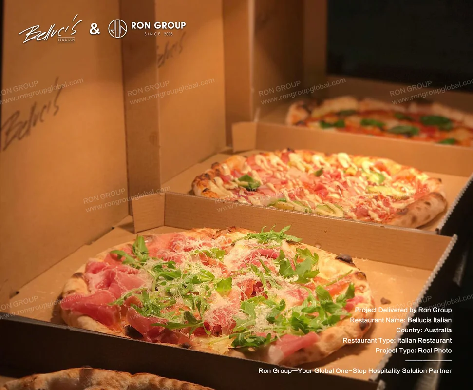 Bellucis pizzas displayed in open boxes