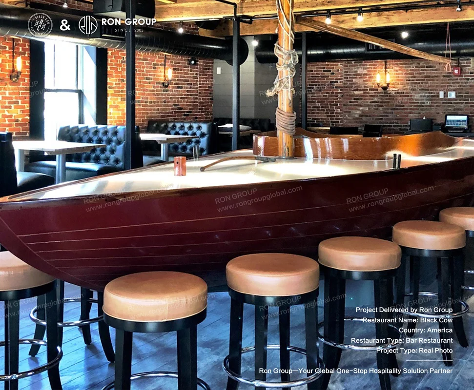 Black Cow Tap and Grill boatshaped bar in restaurant