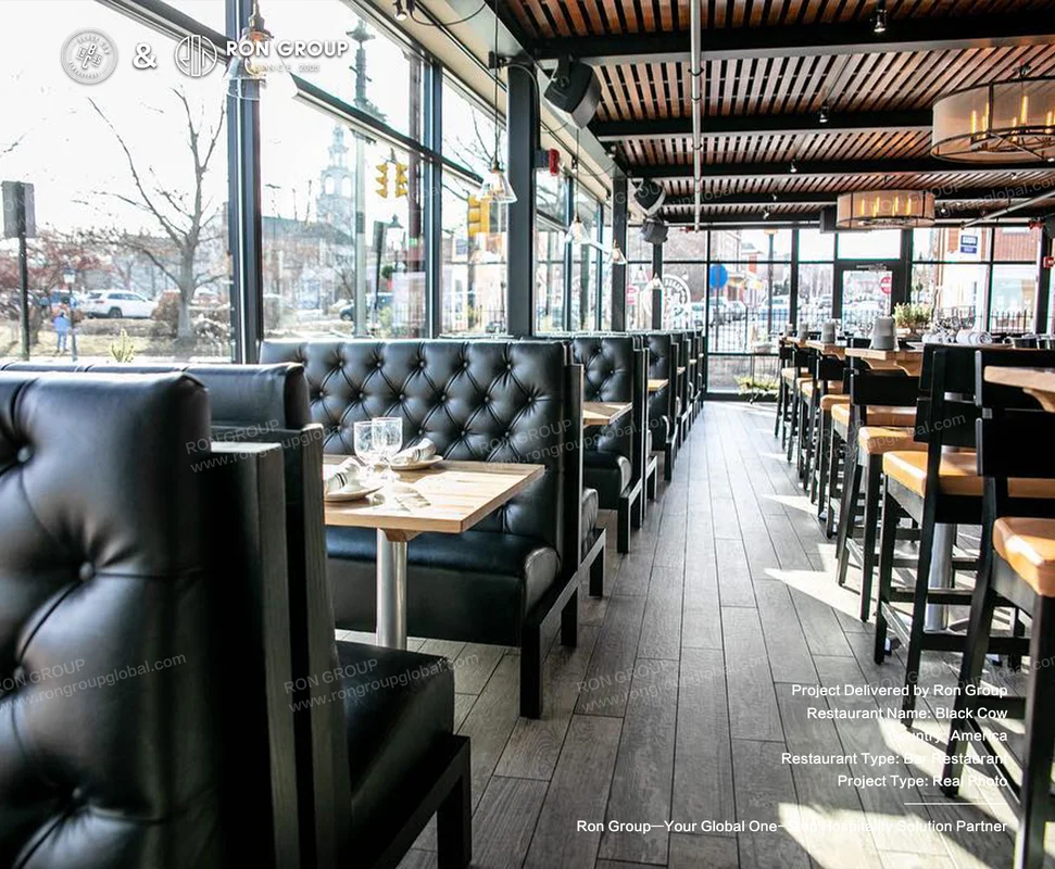 Black Cow Tap and Grill leather booths wood tables