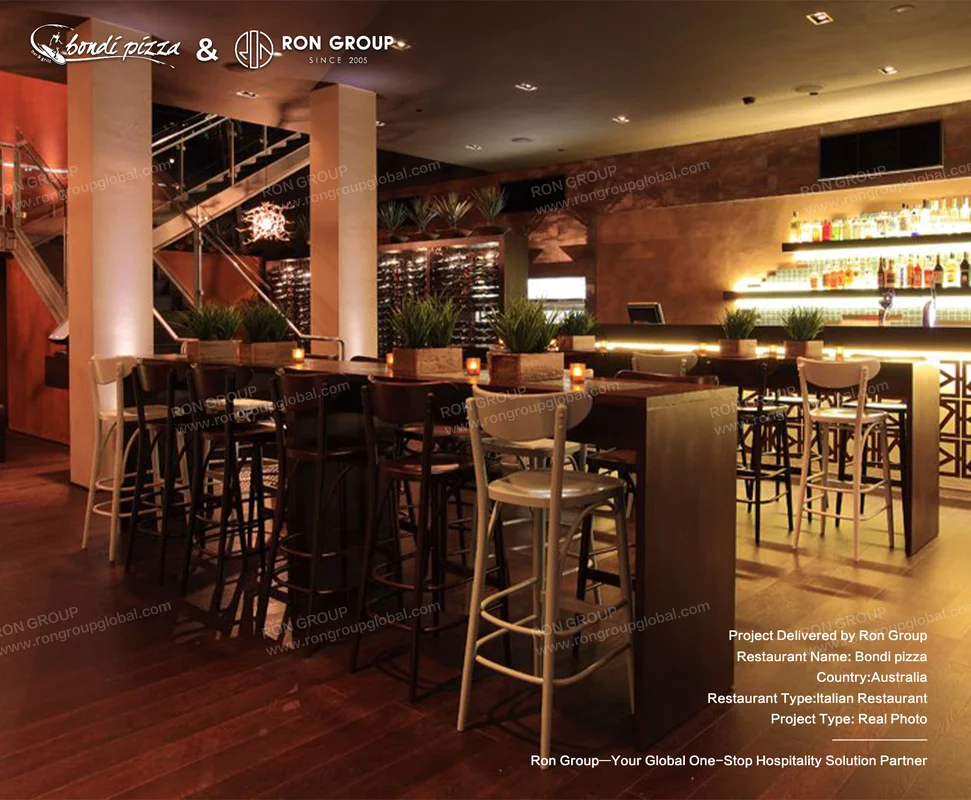 Bondi Pizza bar area with high stools and warm lighting