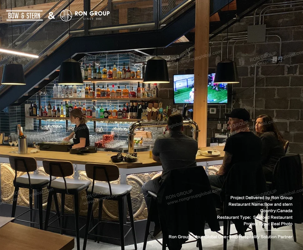 Bow and Stern modern bar interior with brick walls and pendant lights