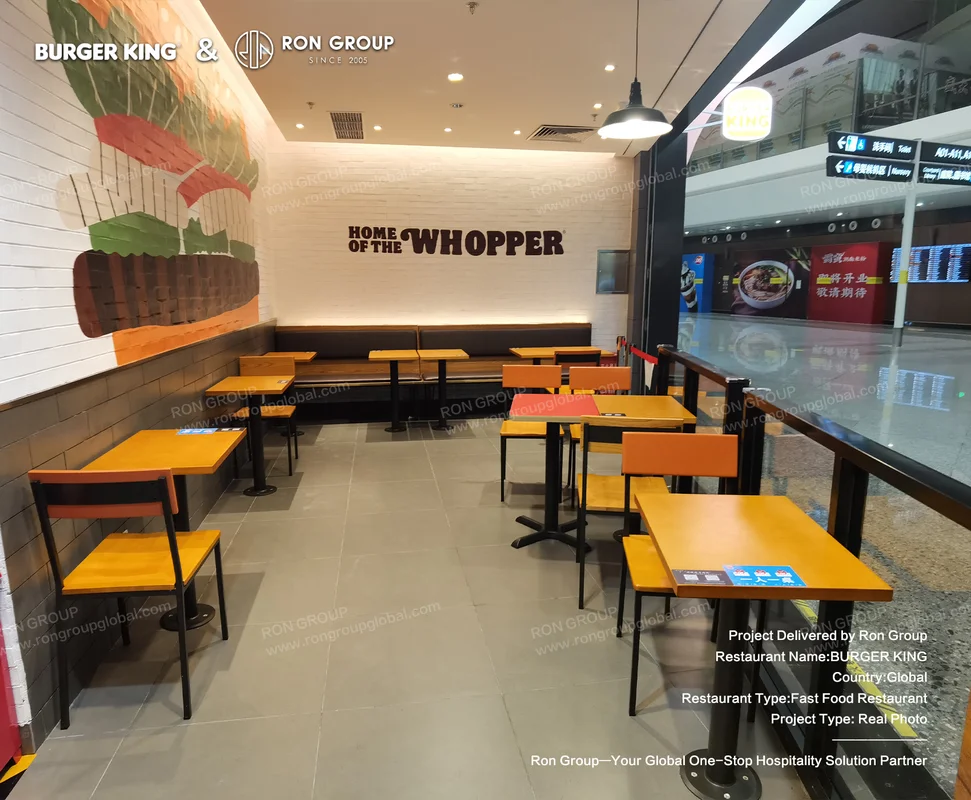 Burger King wooden tables and chairs with mural wall