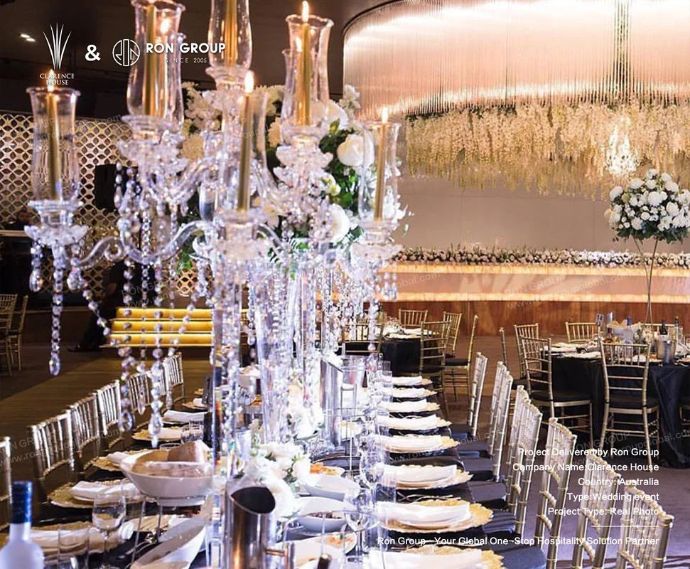 Clarence House wedding reception setup with crystal candelabras and black linens
