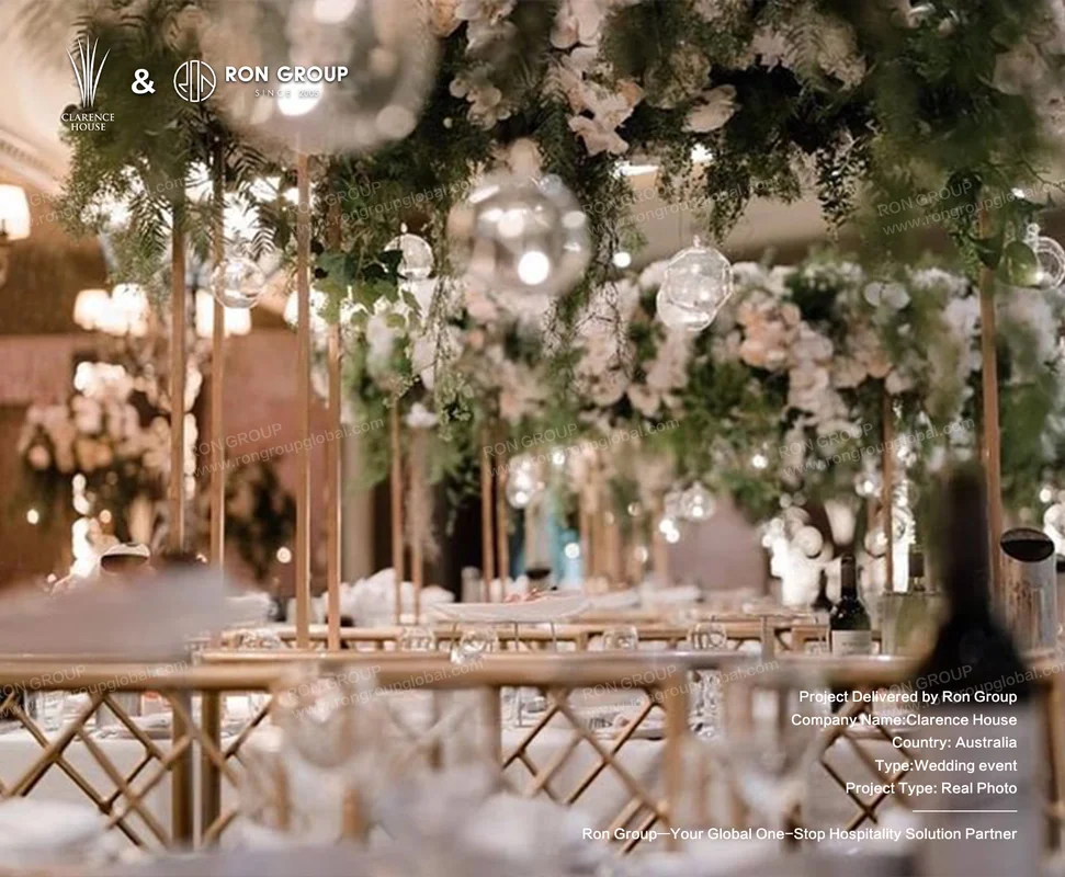 Clarence House floral and greenery archway with gold lattice table