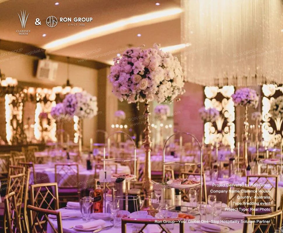 Clarence House floral centerpieces and gold chiavari chairs