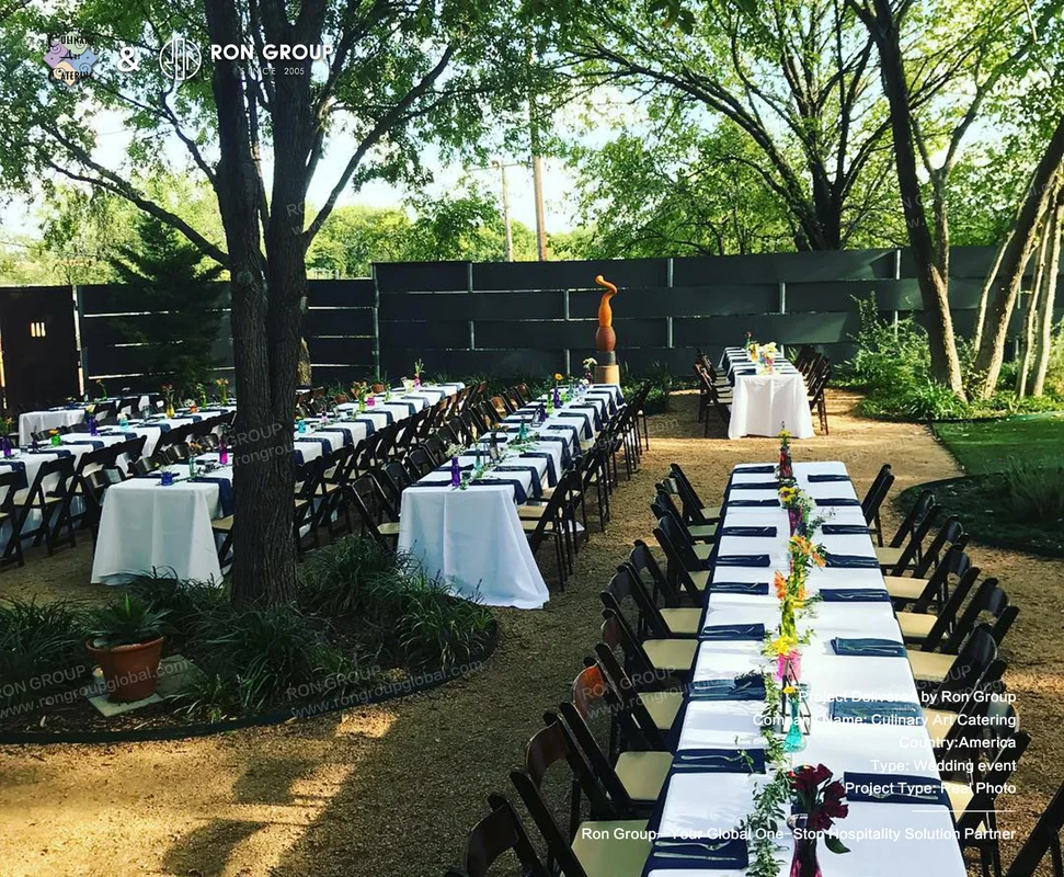 Culinary Art Catering long tables under trees