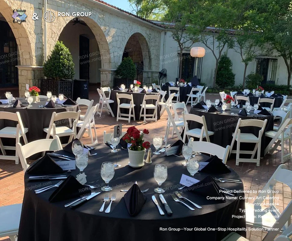 Culinary Art Catering round tables with black linens