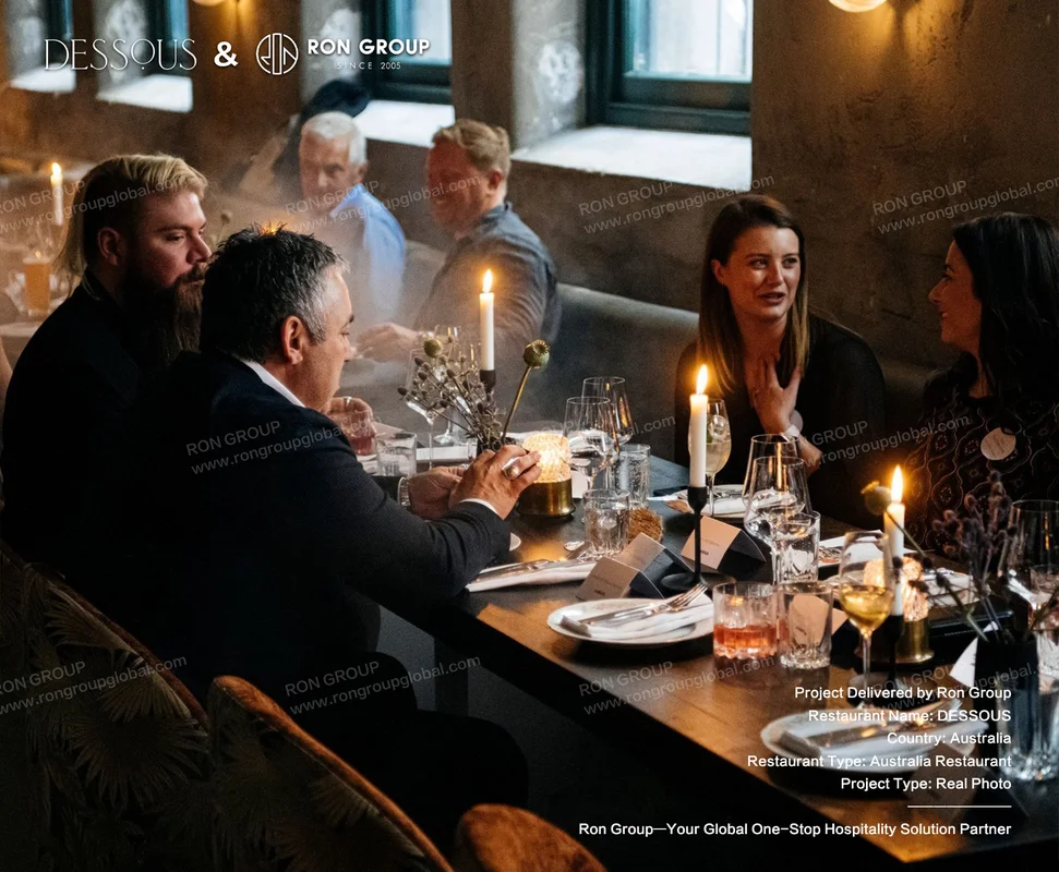 Candlelit dinner gathering at DESSOUS