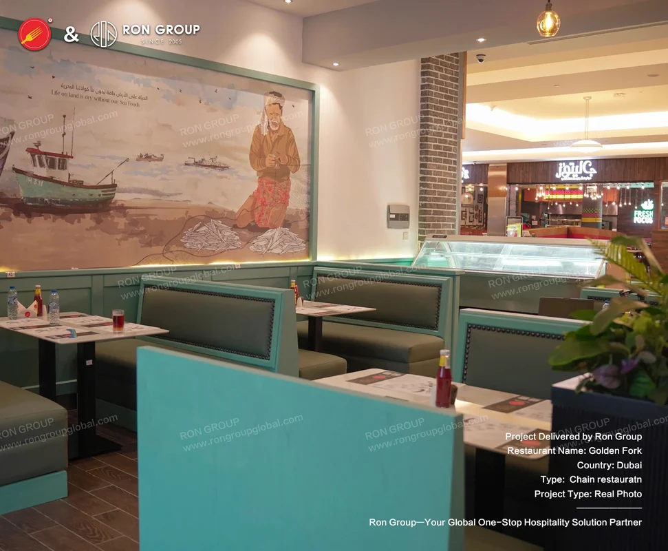 Teal booth seating with fisherman mural