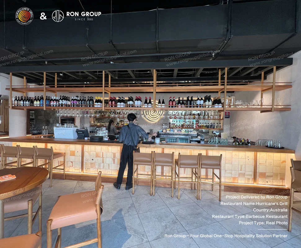 Modern bar with stone counter and leather stools