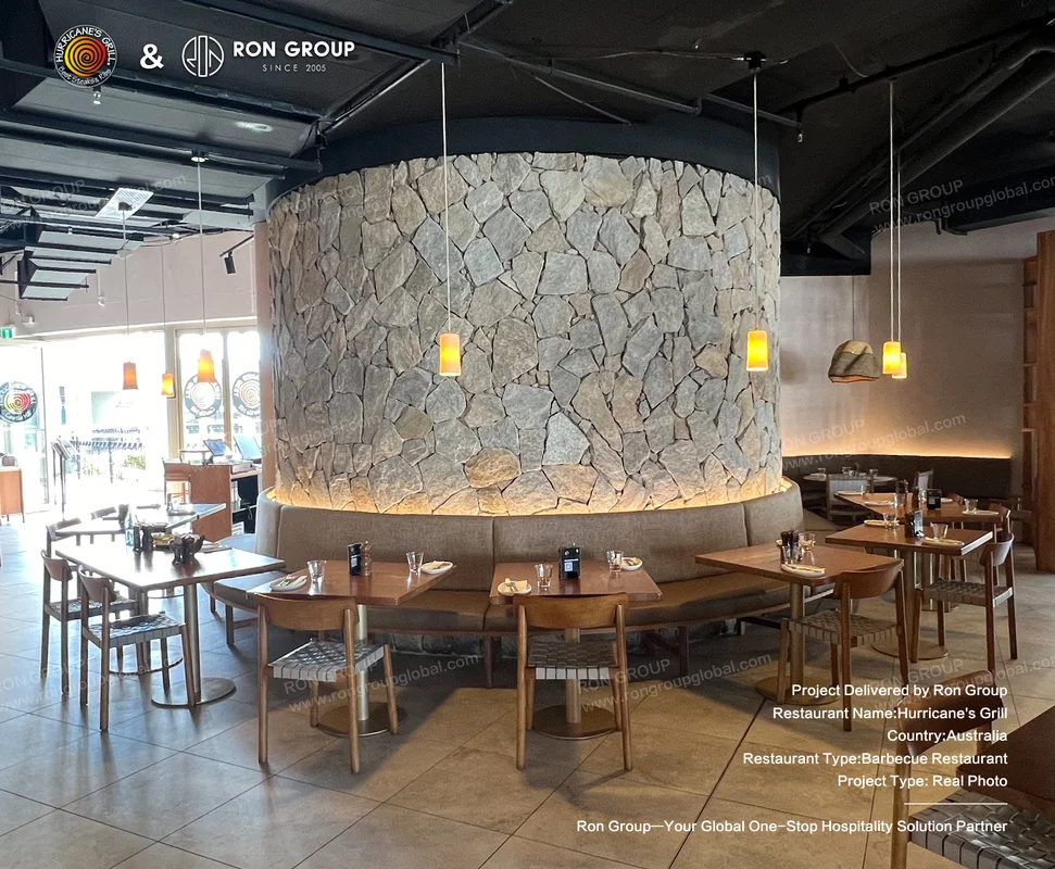 Circular stone pillar with warm underlighting