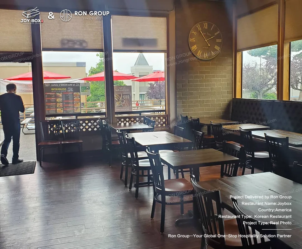 Joybox wooden dining tables and restaurant interior