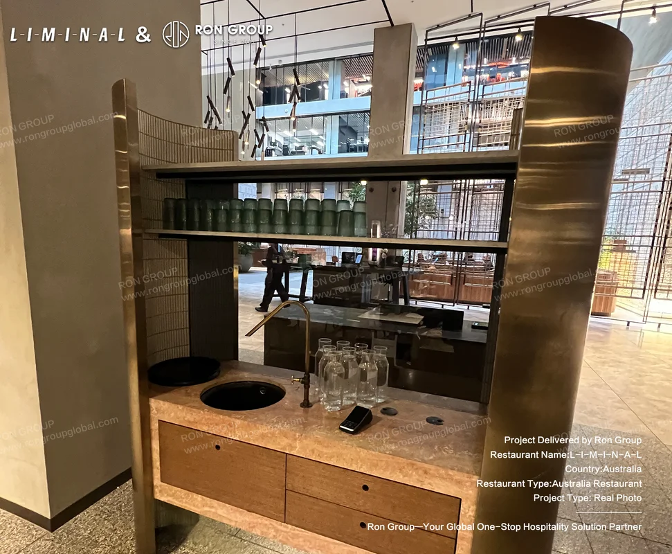 Modern bar station with sink and brass frame