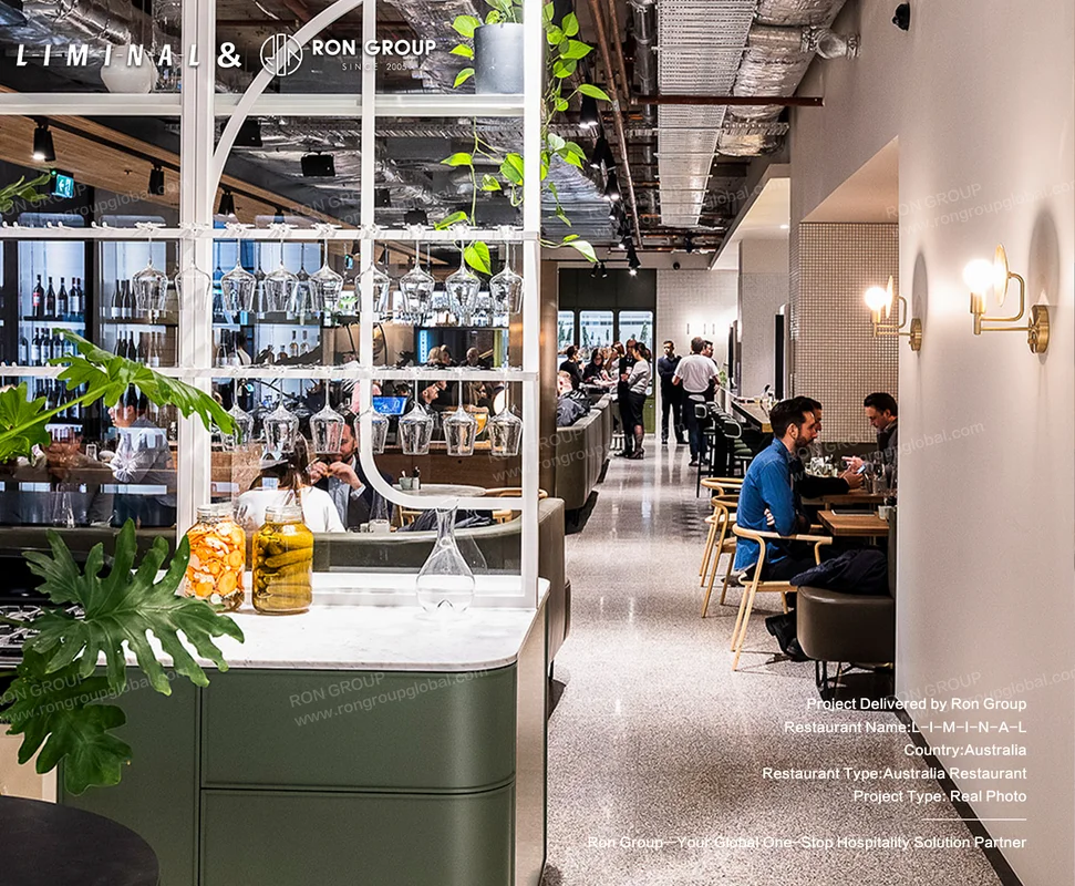 Modern L-I-M-I-N-A-L restaurant interior with bar and dining area