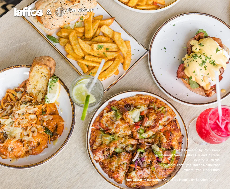 Laffos Bar and Pizzeria assorted pizza pasta brunch dishes and colorful drinks on wooden table