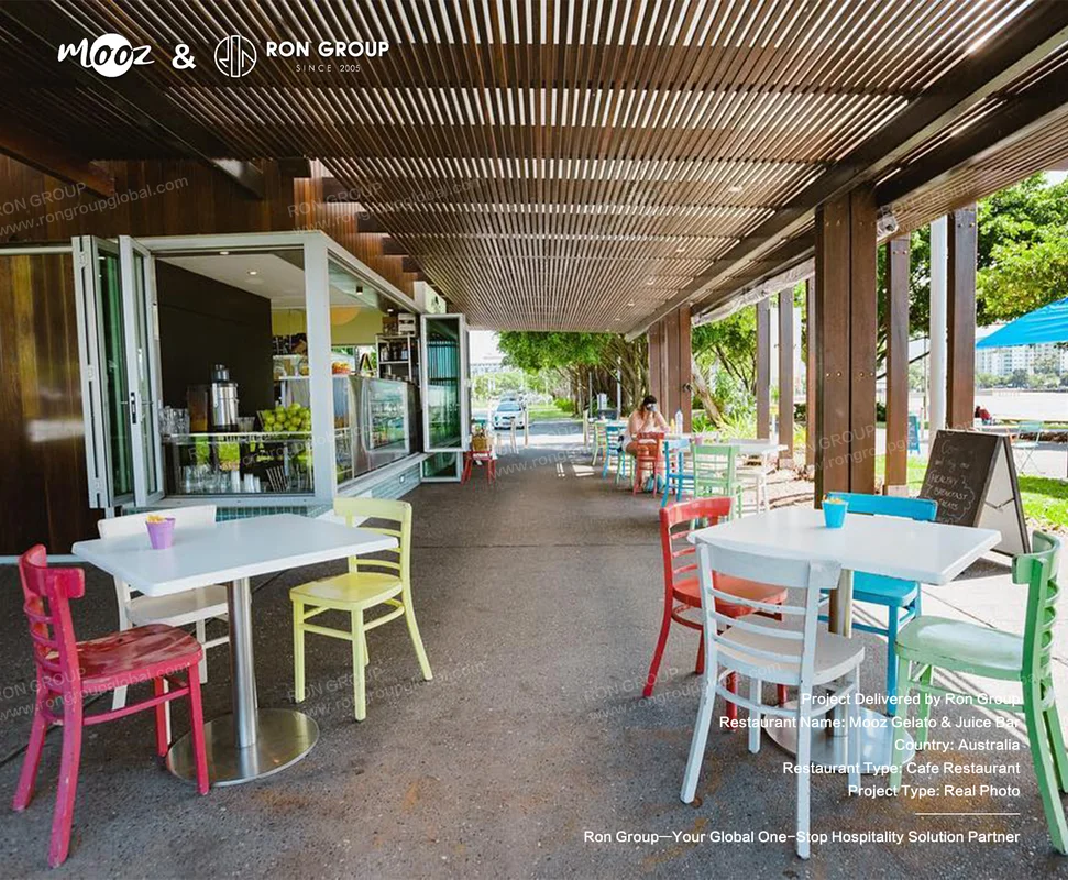 Mooz Gelato and Juice Bar colorful outdoor cafe seating