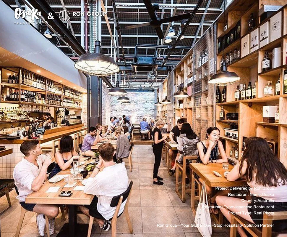 Industrial Japanese restaurant with exposed beams and wooden tables
