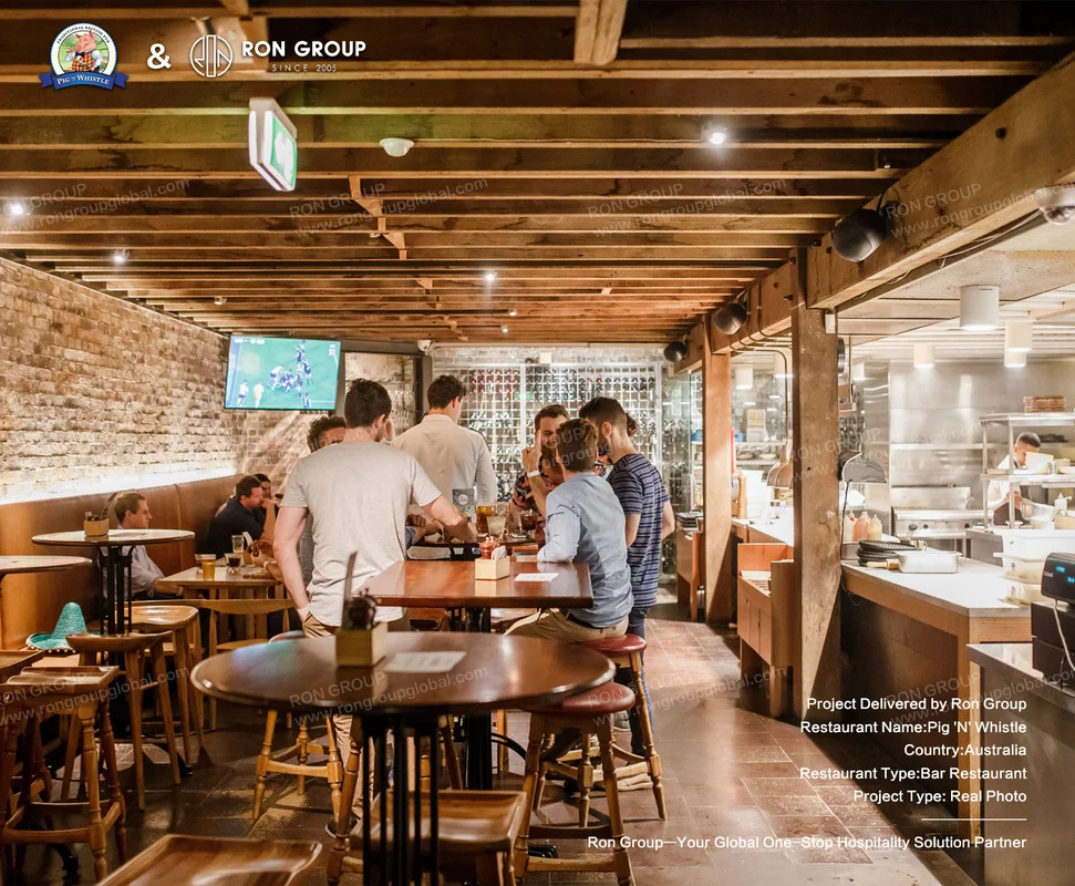 Rustic interior with exposed beams, brick walls and open kitchen