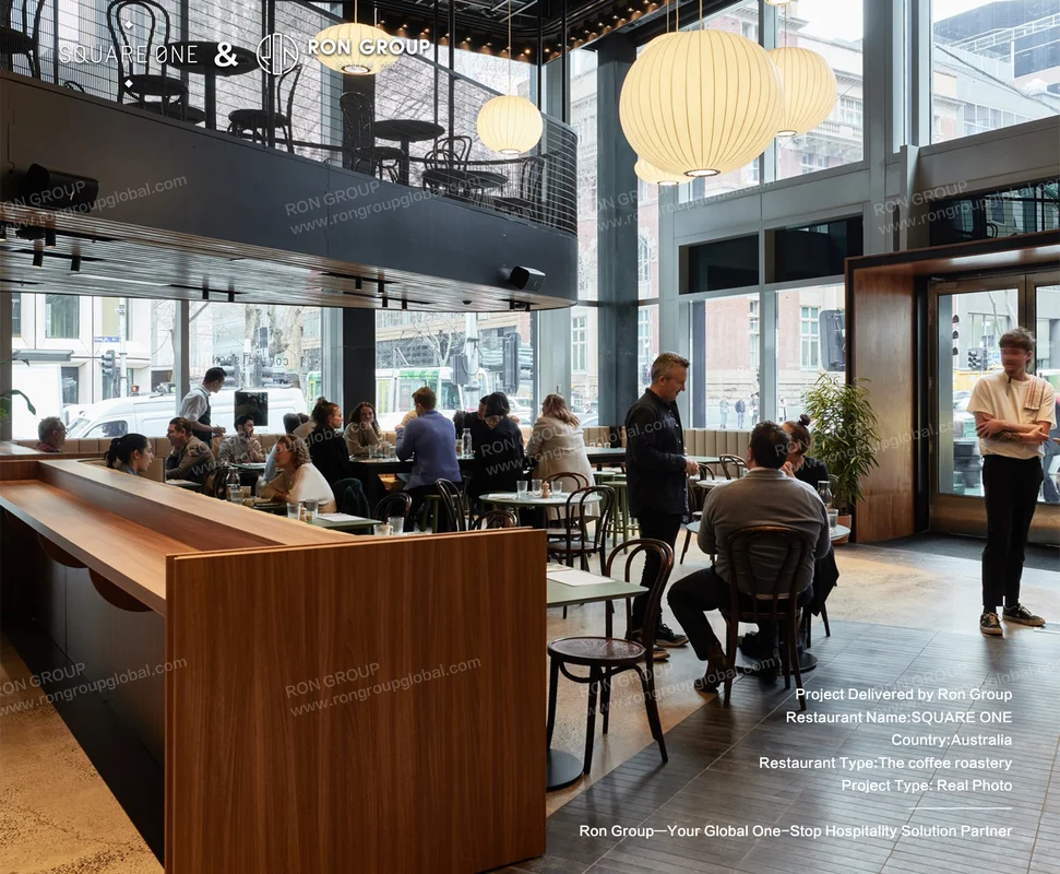 SQUARE ONE modern coffee shop interior with warm timber seating