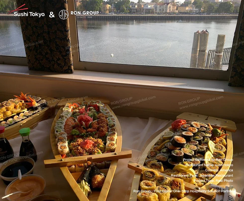 Sushi Tokyo RonGroup-Sushi_Tokyo-Platters_On_Wooden_Boats.webp