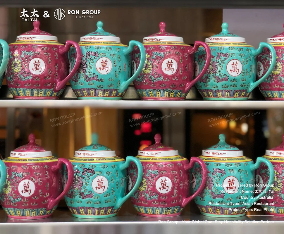 Colourful ceramic teapots on white shelves
