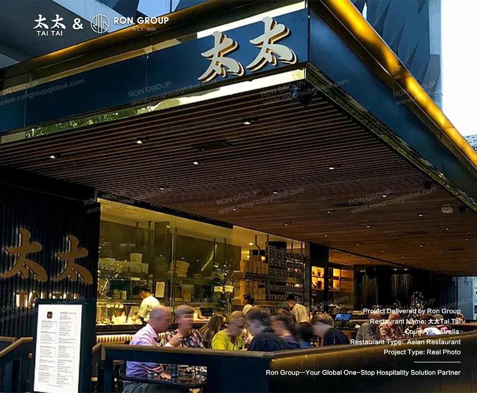 Tai Tai exterior with dark blue facade and golden Chinese characters