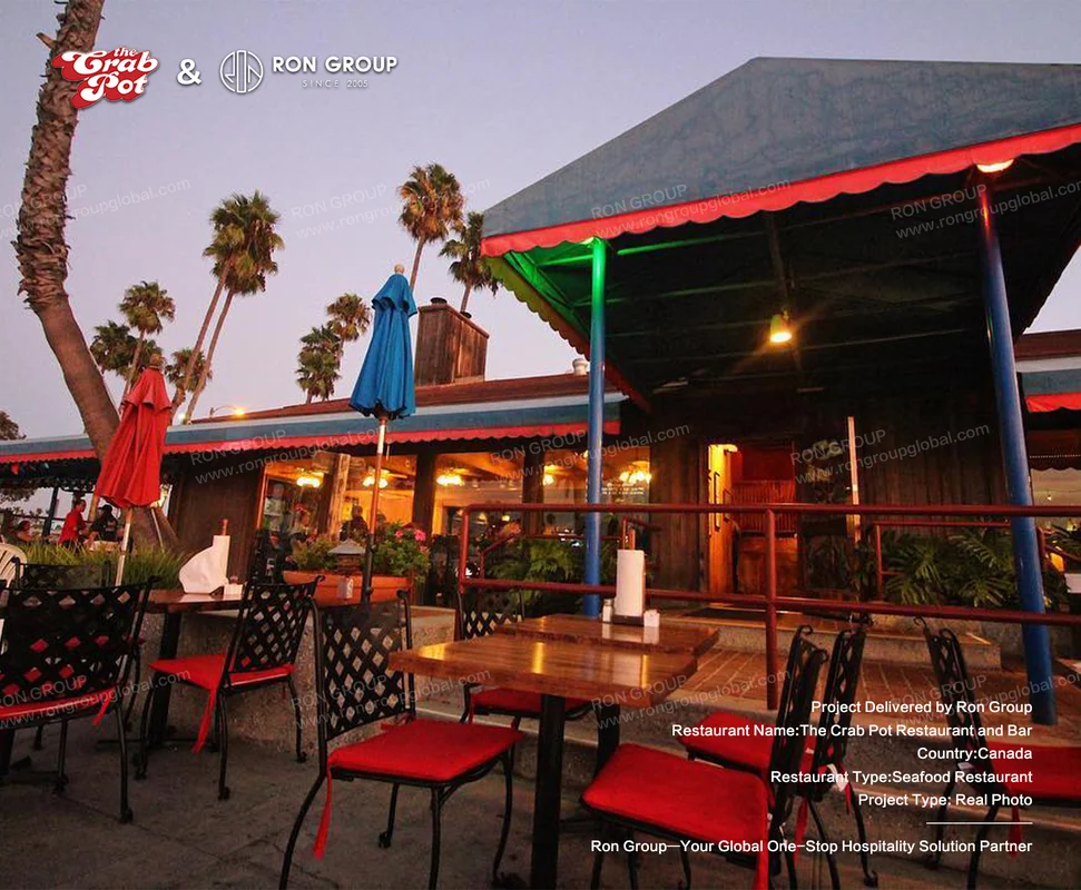 The Crab Pot outdoor seating area with red cushions and wood tables
