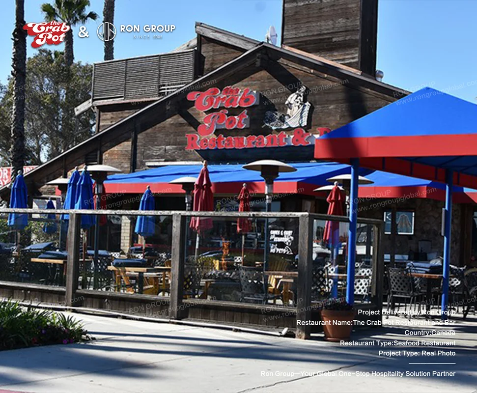 The Crab Pot seafood restaurant exterior with red and blue awnings
