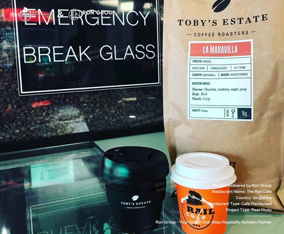 The Rail Cafe Toby's Estate coffee beans and branded cups