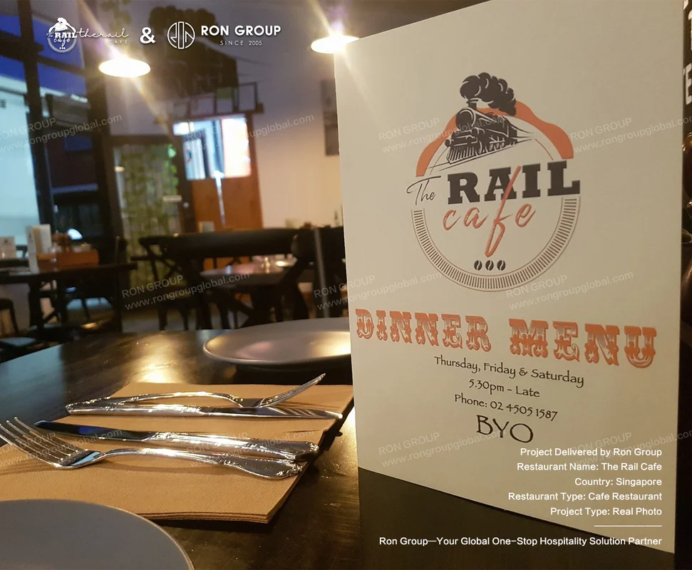 The Rail Cafe table setting with menu and cutlery