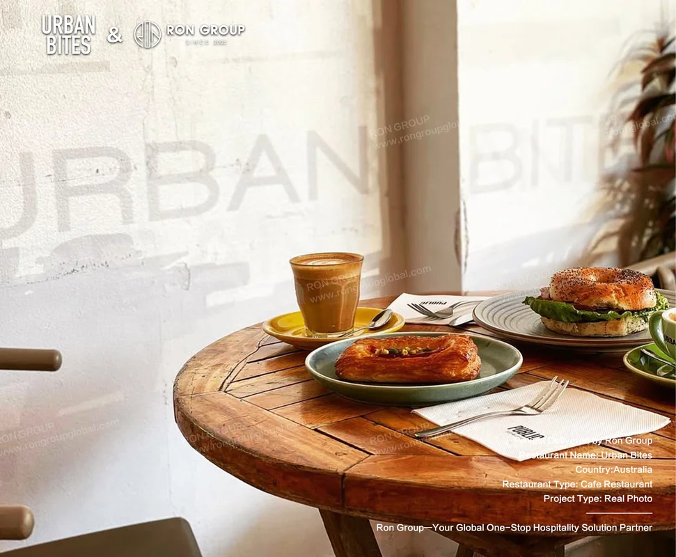 Urban Bites wooden table with coffee and food