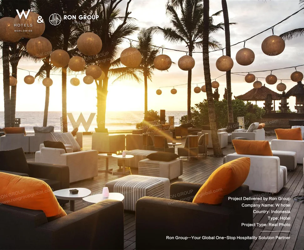 W Bali Seminyak outdoor beachside lounge area with orange cushions and ocean view