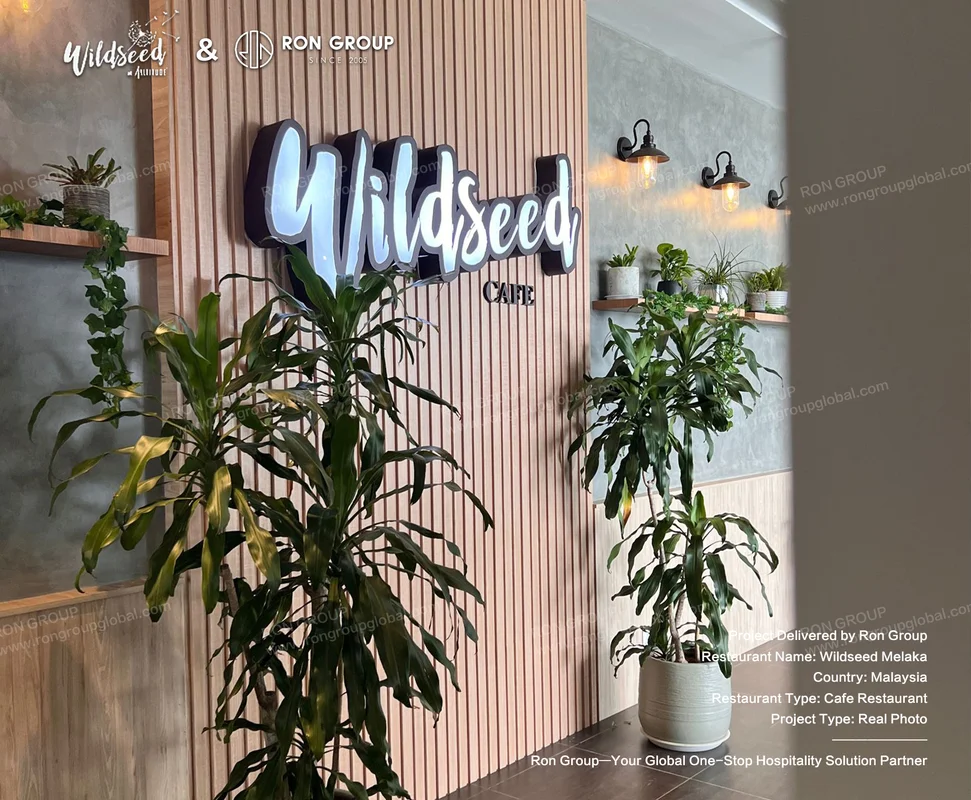 Wildseed modern cafe entrance with plants