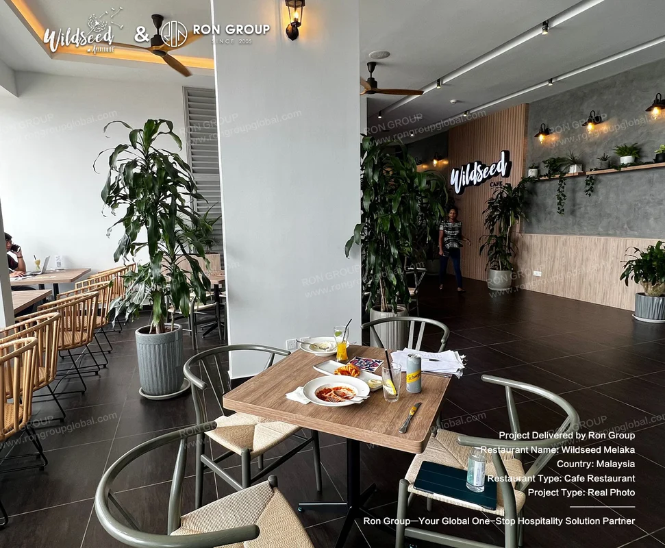 Wildseed wooden tables and green plants