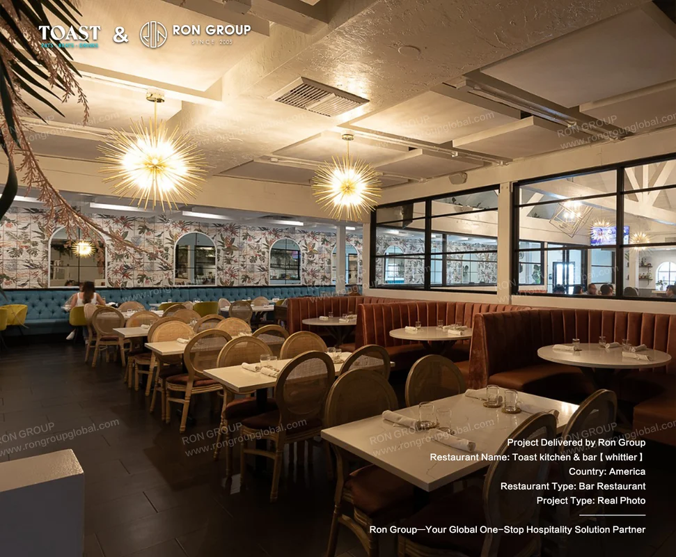 Toast Kitchen & Bar warm lighting and booth seating