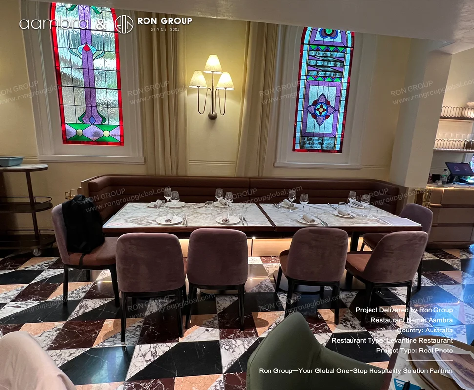 Aambra long marble table with velvet chairs