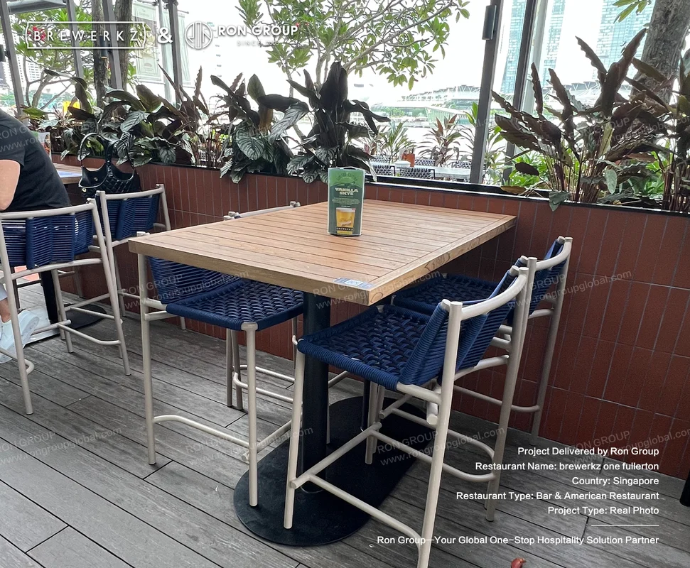 Brewerkz terrace bar table among greenery