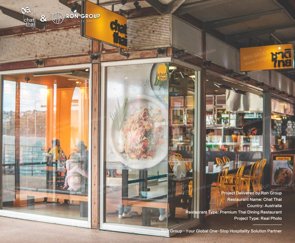 Chat Thai storefront with yellow signage