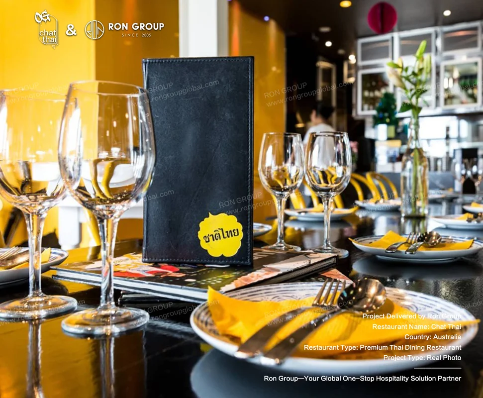Chat Thai table setting with yellow napkins
