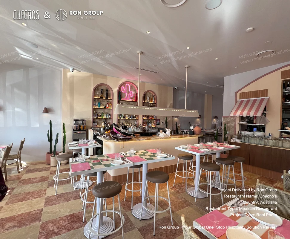 Checho's bar area with checkered tables