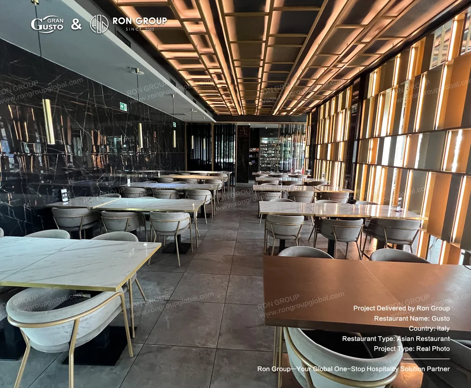 Gusto marble tables and gold accents
